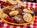 Chocolate oatmeal cookies and sand heart shape cake with blueberries