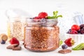 Chocolate Overnight Oatmeal, with chocolate sauce, nuts and fresh berries Royalty Free Stock Photo