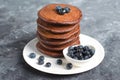 Chocolate Pancakes with Blueberry on grey background, Homemade Dessert, Sweet Breakfast Royalty Free Stock Photo