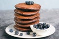 Chocolate Pancakes with Blueberry on grey background, Homemade Dessert, Sweet Breakfast Royalty Free Stock Photo