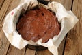 Chocolate pie dough in papered cake pan Royalty Free Stock Photo