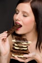 Chocolate - portrait healthy woman eat sweets