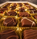Chocolate pralines in close-up view - macro sliding shot