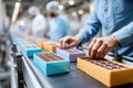 Chocolate production in a bright factory with colorful packaging and vibrant workflow Royalty Free Stock Photo