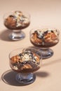 Chocolate profiterole dessert served on a glass