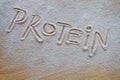 Chocolate protein powder - text protein in powder Royalty Free Stock Photo