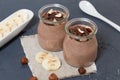 Chocolate pudding with chia seed, bananas and nuts, in a glass Royalty Free Stock Photo