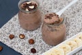 Chocolate pudding with chia seed, bananas and nuts, in a glass Royalty Free Stock Photo