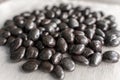 Chocolate raisins on a gray background Royalty Free Stock Photo