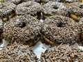 Chocolate rice or chocolate sprinkle doughnuts