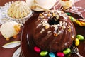 Chocolate ring cake with almonds and nuts topping for easter Royalty Free Stock Photo