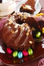 Chocolate ring cake with almonds and nuts topping for easter Royalty Free Stock Photo