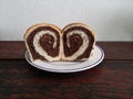 chocolate roll bread cut in half , display lovely heart pattern Royalty Free Stock Photo