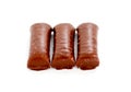 Chocolate rolls on white Royalty Free Stock Photo