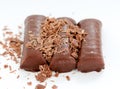 Chocolate rolls on white Royalty Free Stock Photo