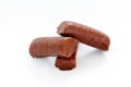Chocolate rolls on white Royalty Free Stock Photo