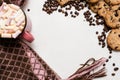 Chocolate scone and cup of latte with marshmallow