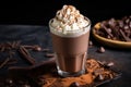 chocolate shake with dusting of cocoa on whipped cream