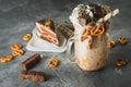 Chocolate shake with milk, dripping sauce, cream, cake and cookie Royalty Free Stock Photo