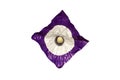 Chocolate in the shape of a mountain. A delicious gift. On a beautiful purple wrapper with a white circle in the