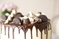 Chocolate smoky festive cake decorated with chocolate. Close-up
