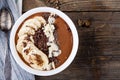 Chocolate smoothie bowl with banana, chia seeds and almond chips Royalty Free Stock Photo