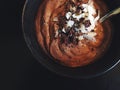 Chocolate smoothie bowl with coconut, chia seeds and cacao nibs Royalty Free Stock Photo