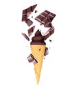 Chocolate soft serve ice cream with crushed chocolate bar in wafer cone close-up, isolated on white background