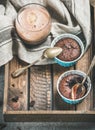 Chocolate souffle in baking cups and mocha coffee in glass Royalty Free Stock Photo