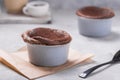 Chocolate Souffle with frozen blueberry . French traditional dessert Royalty Free Stock Photo