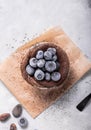 Chocolate Souffle with frozen blueberry . French traditional dessert Royalty Free Stock Photo