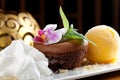 Chocolate souffle with mango ice cream Royalty Free Stock Photo