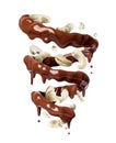 Chocolate splashes in spiral shape with crushed cashew nuts, isolated on a white background Royalty Free Stock Photo