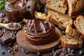 Chocolate spread being spread on a slice of bread with chocolate chips on a wooden board Royalty Free Stock Photo