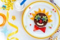 Chocolate spread sandwich clown with fresh fruit for kids Royalty Free Stock Photo