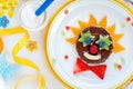 Chocolate spread sandwich clown with fresh fruit for kids Royalty Free Stock Photo