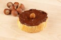 Chocolate spread with whole hazelnuts on slice of baguette Royalty Free Stock Photo