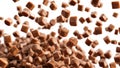 Falling Caramel Cubes on White Background Royalty Free Stock Photo