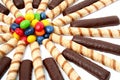 Chocolate sticks with a cream and the multi-coloured sweets isol Royalty Free Stock Photo