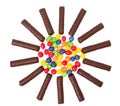 Chocolate sticks with a cream and the multi-coloured sweets isol Royalty Free Stock Photo