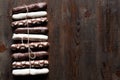 Chocolate sticks on dark wooden background Royalty Free Stock Photo