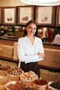 Chocolate Store. Female Seller In Confectionery Shop. Royalty Free Stock Photo