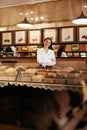 Chocolate Store. Female Seller In Confectionery Shop. Royalty Free Stock Photo