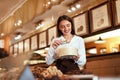 Chocolate Store. Woman Working In Chocolate Shop Royalty Free Stock Photo