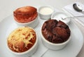 Chocolate, strawberry and coconut souffles