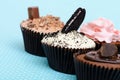 Chocolate Strawberry Cookies and cream cup cake on vintage table cloth Royalty Free Stock Photo