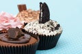 Chocolate Strawberry Cookies and cream cup cake on vintage table cloth