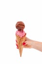 Chocolate and strawberry ice cream cone on white background.