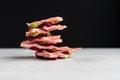 Chocolate with sublimated raspberries and cashew nuts on a black background