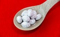 Chocolate and Sugar coated Almonds on Spoon Royalty Free Stock Photo